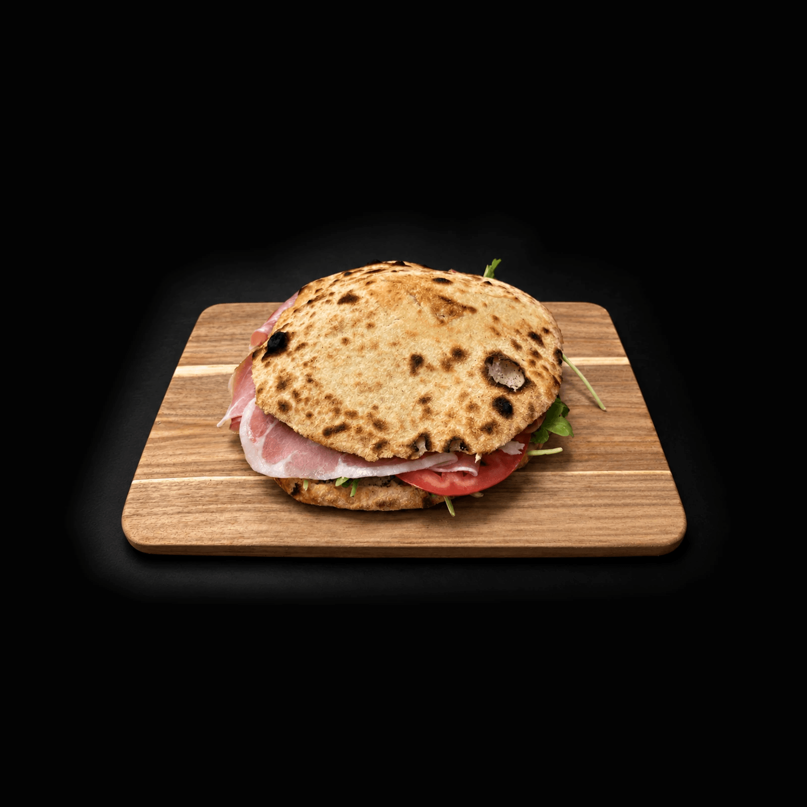 An A Pagnotta sandwich on a wooden board