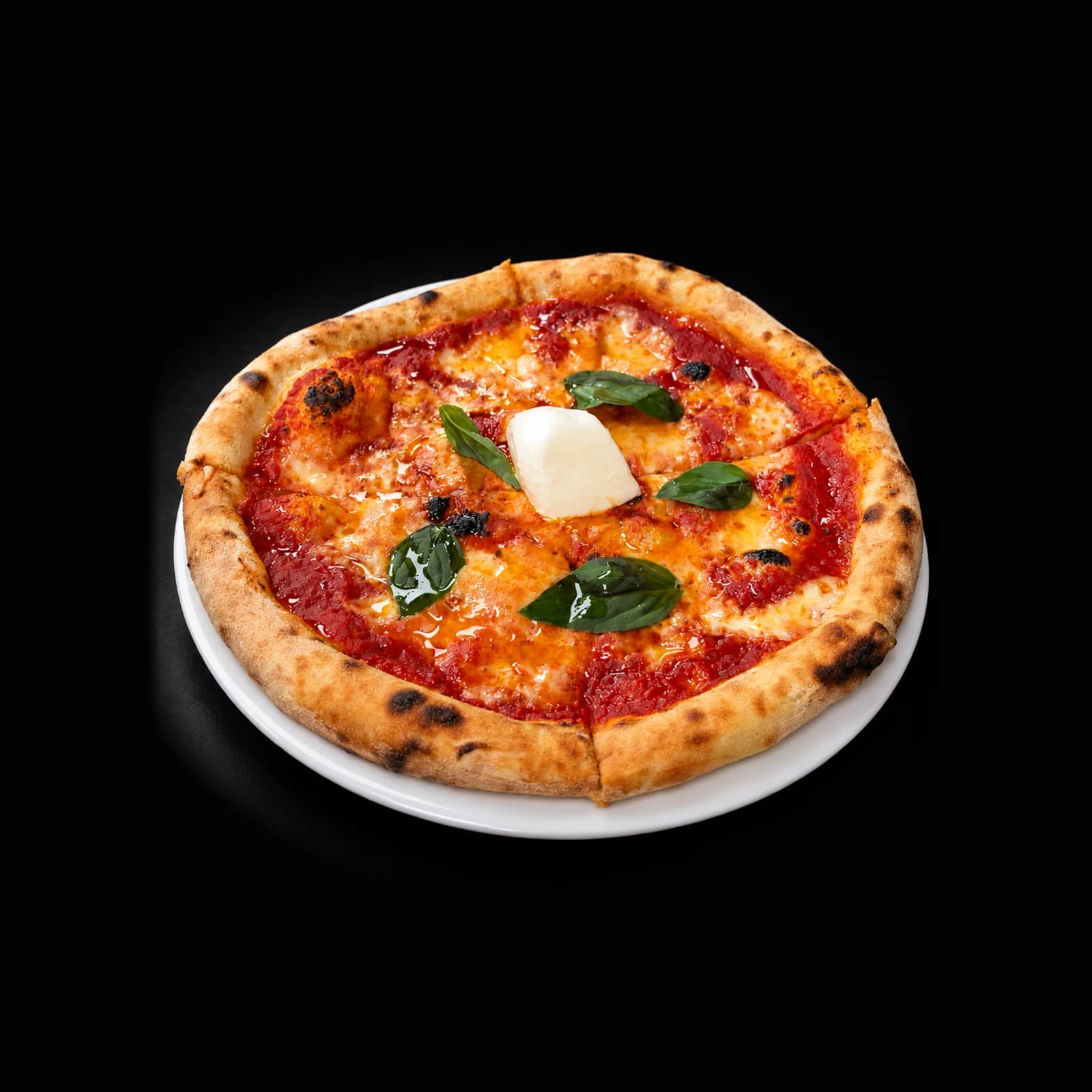 A Pagnotta Margherita pizza with tomato sauce, mozzarella, and basil